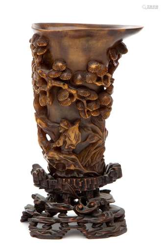 A Chinese carved buffalo horn libation cup