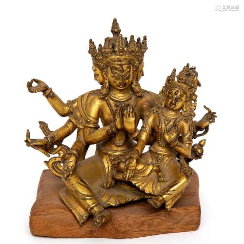 A Bodhisattva and consort