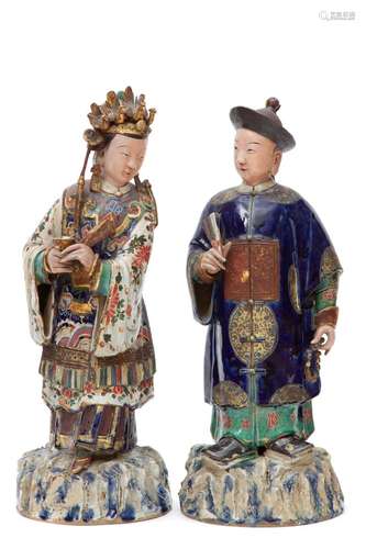 A large pair of China trade painted clay figures