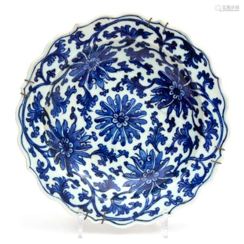 A blue and white Ming dish with foliate rim