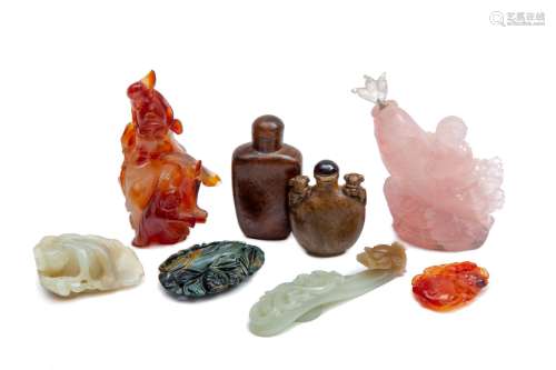 A collection of Chinese carved hardstone, jade and wood carv...