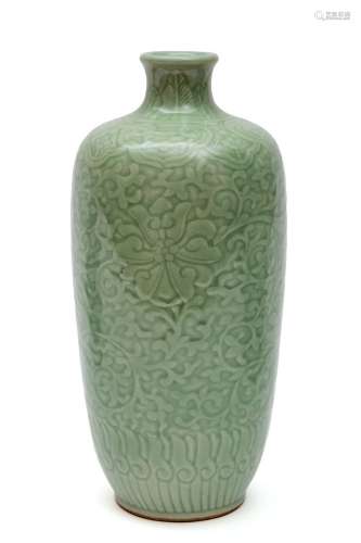 A celadon vase with scrolling lotus relief