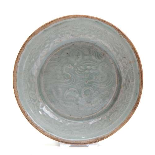 A Qingbai dish with moulded lotus pond relief