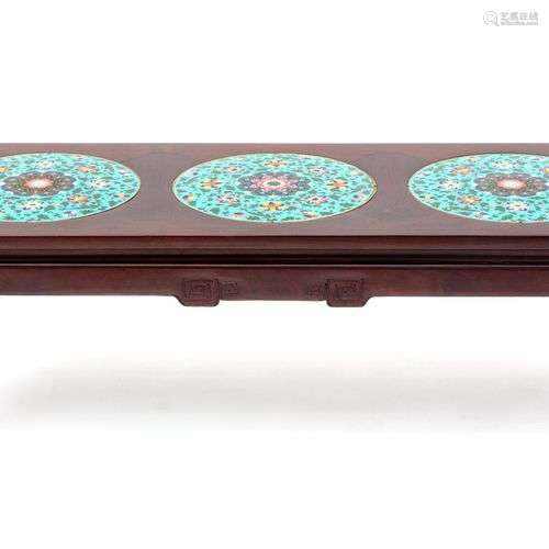 A Chinese carved hardwood and cloisonné low table