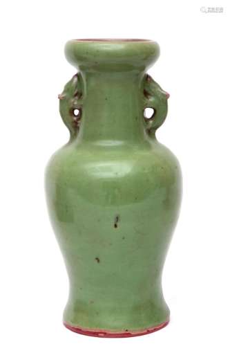 A Chinese celadon baluster vase with rat handles
