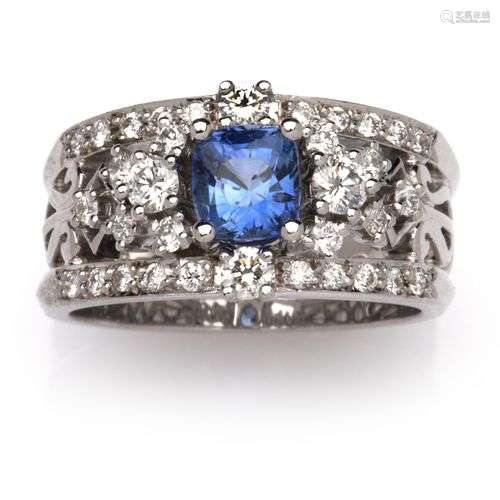 An 18k white gold sapphire and diamond ring