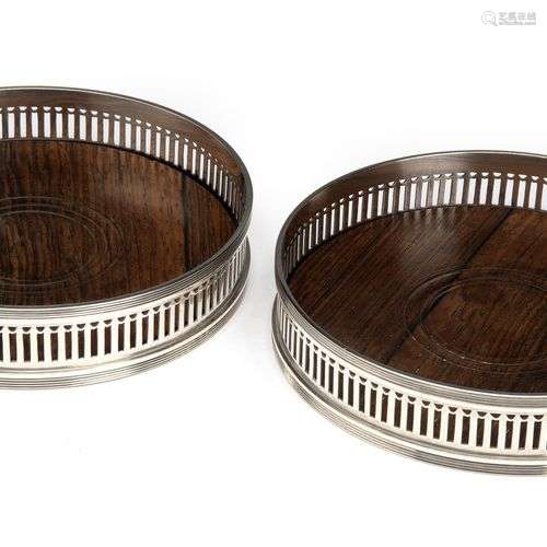 A pair of Dutch silver and wood wine coasters