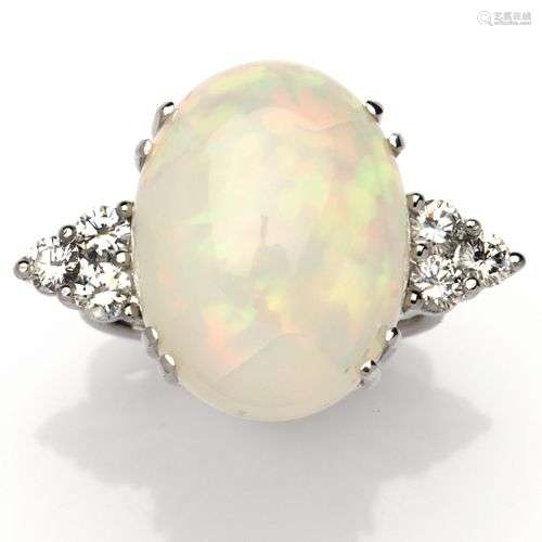 An opal and diamond ring