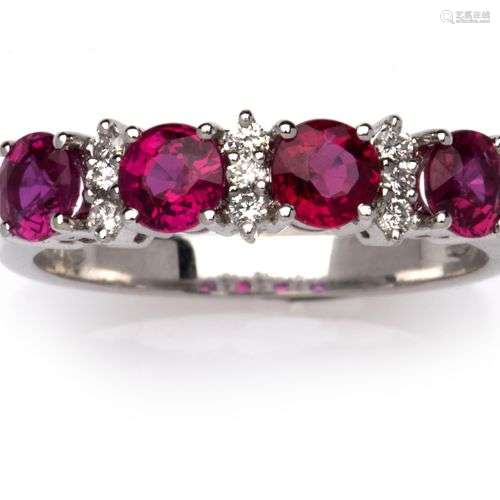 An 18k white gold ruby and diamond ring