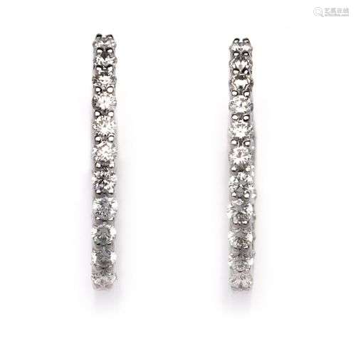 A pair of Diamond Earrings