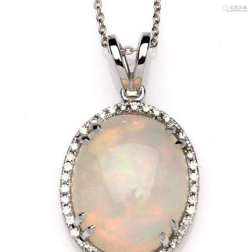 An opal and diamond pendant on chain