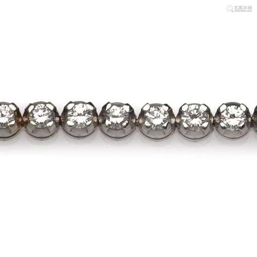 An 18k white gold diamond bracelet