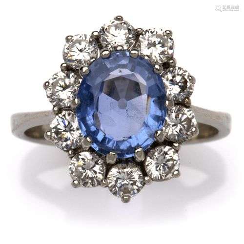 A 14k white gold Burma sapphire and diamond ring