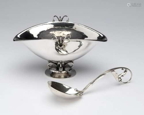 A Danish silver sauce boat and sauce serving spoon, Georg Je...
