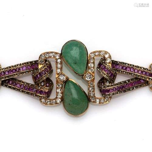 A 14k gold emerald and ruby bracelet