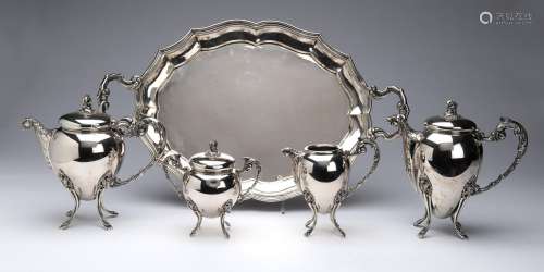 A large silver four-piece coffee- and tea service and tray