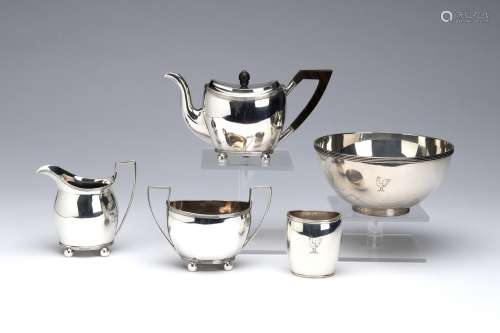 A three- piece small silver tea service and a rinse bowl and...