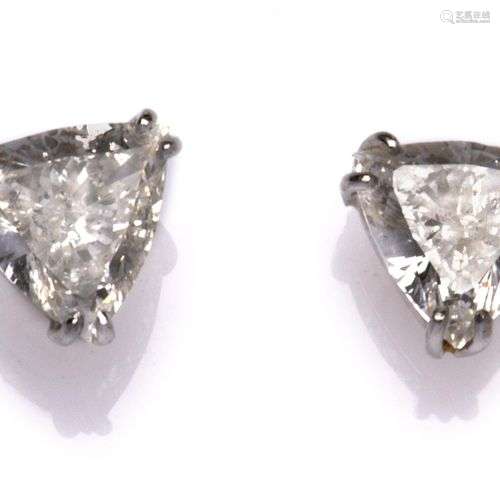A pair of 18k white gold diamond single stone earstuds