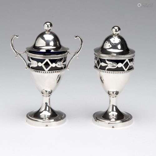A Dutch silver mustard pot and a pepperette with blue glass ...