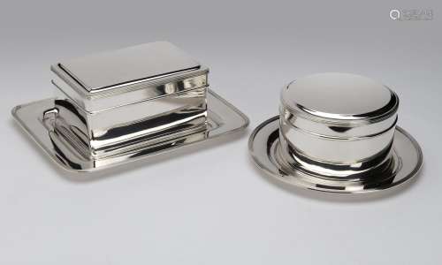 A pair of Dutch silver biscuit boxes with trays
