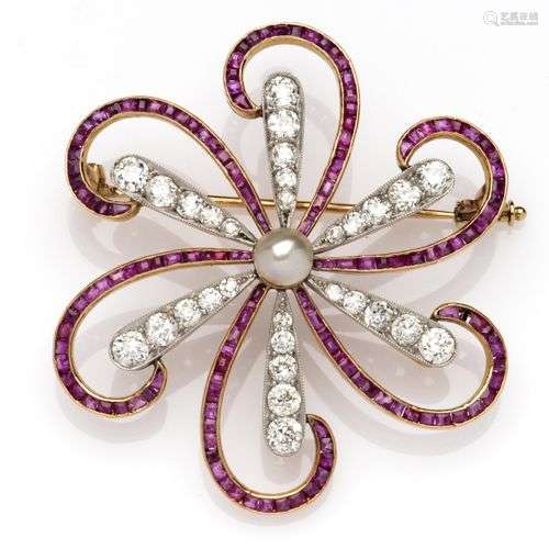 A platinum and 18k gold ruby and diamond brooch