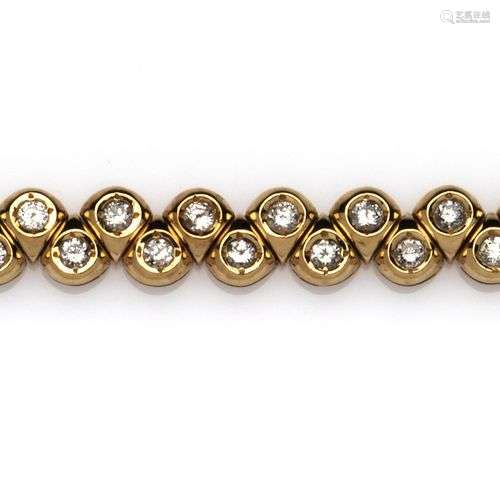 An 18k gold diamond line bracelet