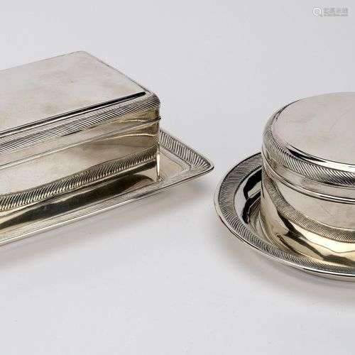 A pair of Dutch silver biscuit boxes with trays