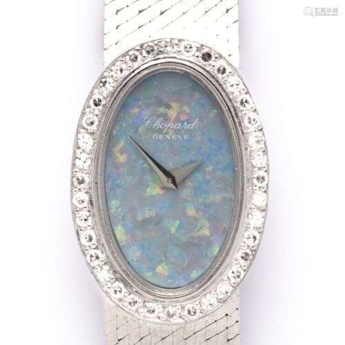 An 18k white gold bracelet watch with opal dial, by Chopard
