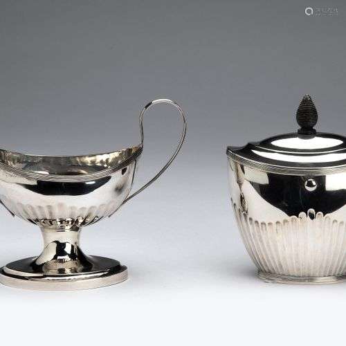 A Dutch silver sugar bowl and a silver tea caddy