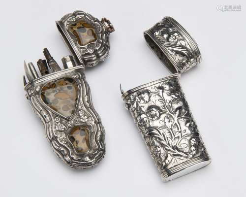 A silver lancet case an a silver and jasper lancet case