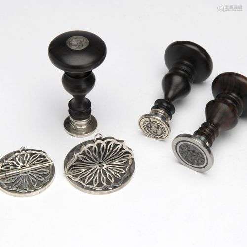 Three silver and wood sealing stamps and two foldable sealin...