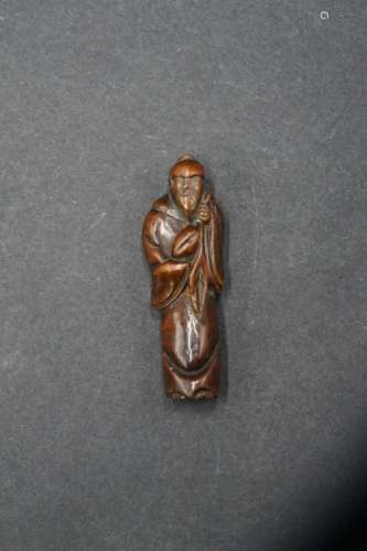 Netsuke en buis