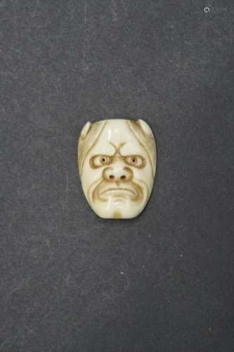 Netsuke masque en ivoire Hannya