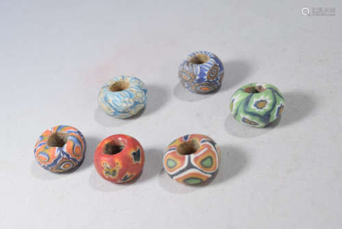 A Group of Colorful Glass Bead Set