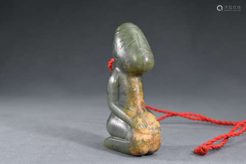 A Green Jade Kneeling Man Figure Statue