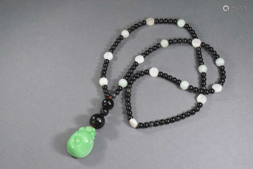A Jadeite Pendant Necklace
