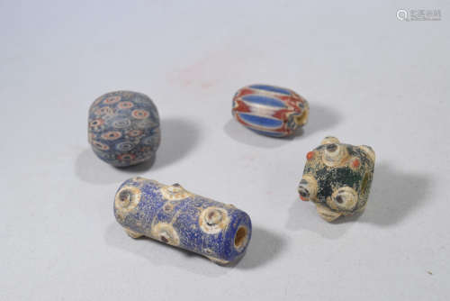 A Group of Four Colorful Glass Bead Set