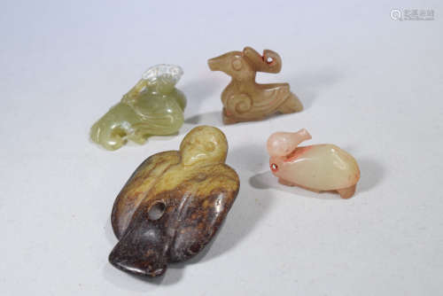 A Group of Four Jades Bird Figure Ornament Set