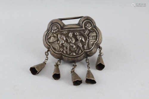 A Chinese Silver Carved Kylin with Child Ruyi Shape Lock
