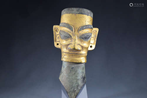 A Gilt Bronze Sanxindui Man Face Statue