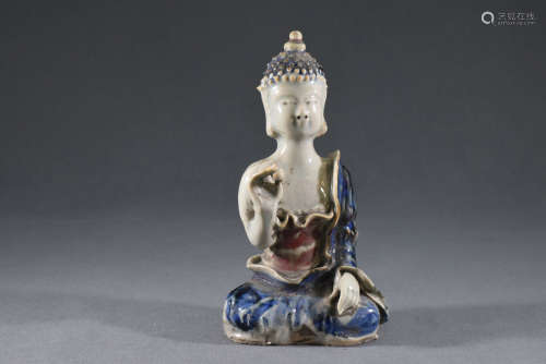 A Blue and White Glazed Porcelain Sitting Buddha Figure Stat...