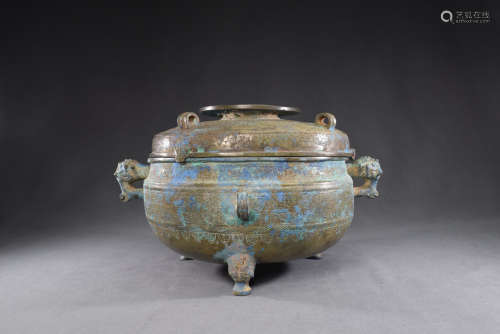 A Chinese Bronze Double Ear Three Feet Container Pot