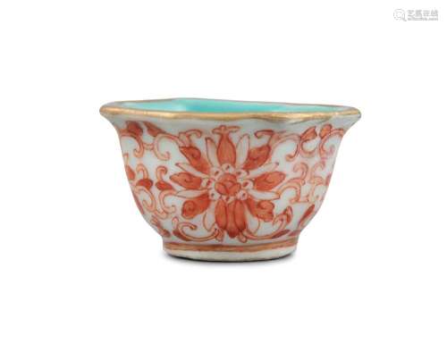 A SMALL IRON RED PORCELAIN 'LOTUS' WINE CUP China, Qing Dyna...