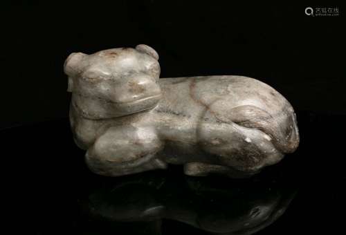 A MOTTLED JADE CARVING OF A RECUMBENT WATER BUFFALO China, Q...