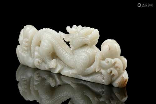 A DECORATIVE 'DRAGON CHASING THE PEARL' JADE BRUSH REST Chin...