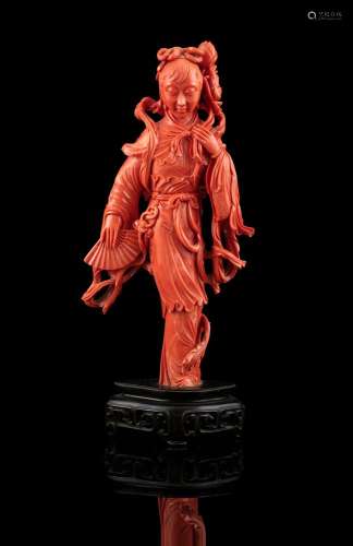 *A VERY LARGE RED CORAL MODEL OF A STANDING LADY WITH A FAN ...