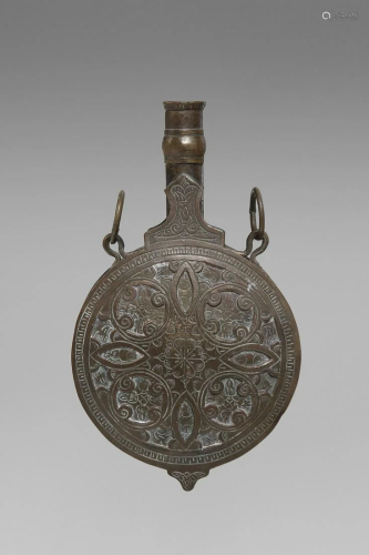 Arte Islamica A brass engraved powder flask North