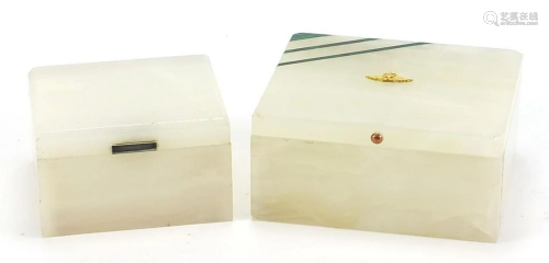 Two onyx cigarette boxes comprising one silver mounted