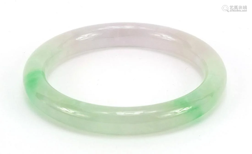 Chinese green and white jade bangle, 7.2cm in diameter,