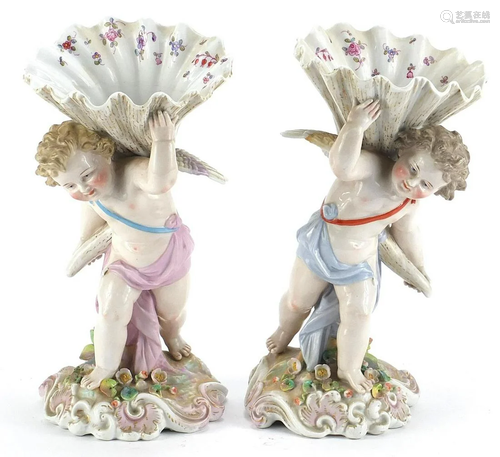 Pair of Continental porcelain Putti and cornucopia